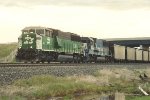 Loaded coal train rolls west